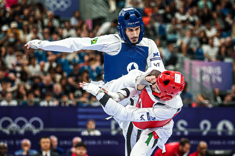 Edival Pontes "Netinho" (azul) enfrenta Zaid Kareem, da Jordânia,, na categoria até 68kg. - Foto: Wander Roberto/COB